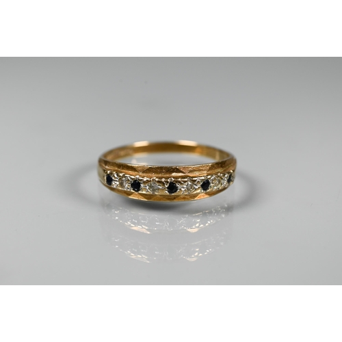 288 - A 9ct yellow gold signet ring, size U, approx 3.6g to/w a white sapphire half eternity ring set unma... 