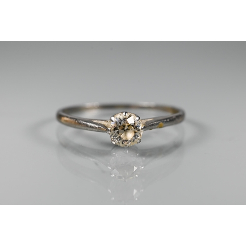 295 - A single stone diamond ring set unmarked white metal, size P, approx 0.35 carats