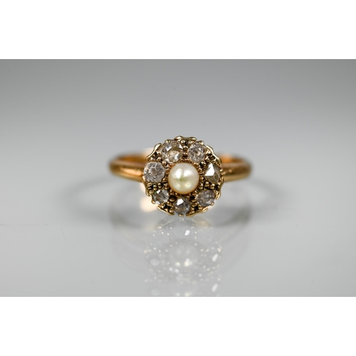 296 - An antique diamond and pearl set cluster ring, the seven old cut diamonds around a central half pear... 