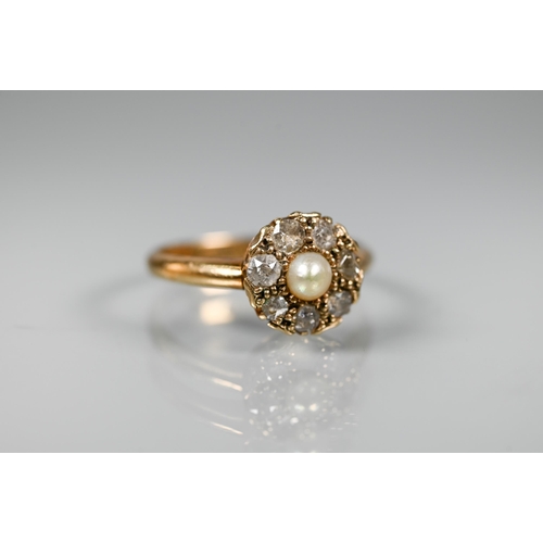 296 - An antique diamond and pearl set cluster ring, the seven old cut diamonds around a central half pear... 