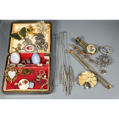 298 - A collection of costume jewellery including brooches, gilt metal bracelet, necklace, and Avia expand... 