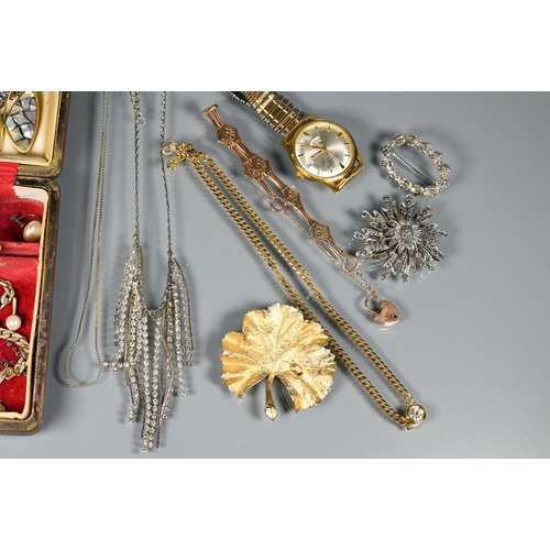 298 - A collection of costume jewellery including brooches, gilt metal bracelet, necklace, and Avia expand... 