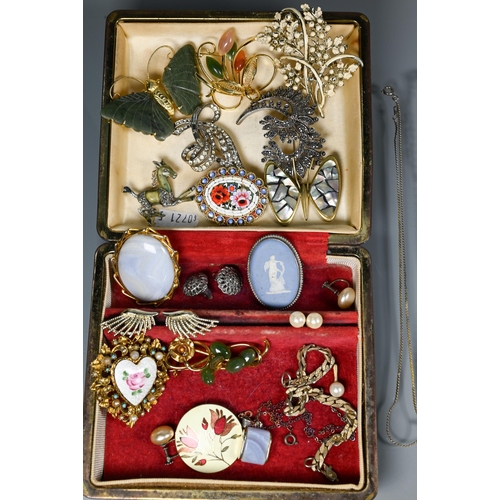 298 - A collection of costume jewellery including brooches, gilt metal bracelet, necklace, and Avia expand... 