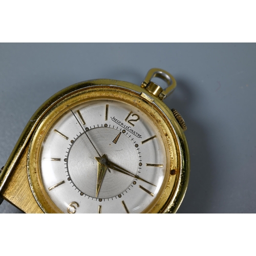 309 - A Jaeger le Coultre gilt cased fob watch, the silvered dial with gilt baton numerals, keyless wind m... 