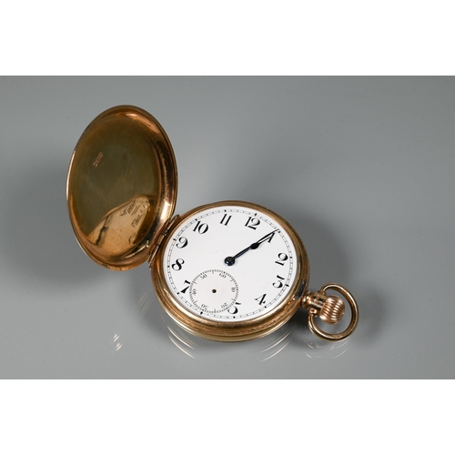 311 - A 9ct gold full hunter pocket watch, crown wind movement, the white enamelled dial with Arabic numer... 