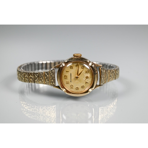 312 - A lady's Richmond brand cocktail wristwatch, 9ct gold cased with champagne dial and subsidiary secon... 