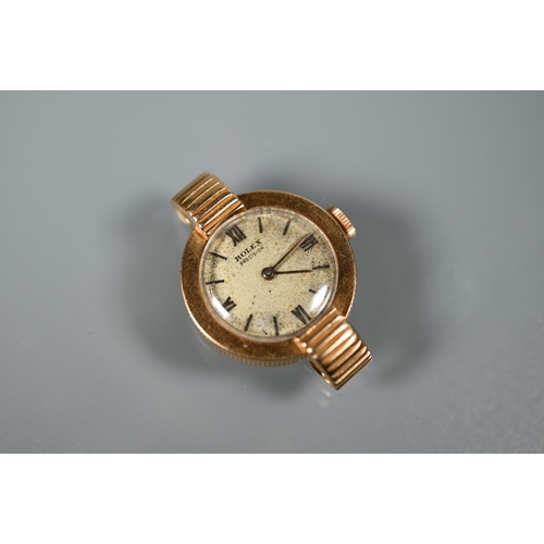 318 - An 18K gold ladies Rolex wristwatch, with 18 jewel movement and champagne dial, 21 mm dia., 12 g all... 