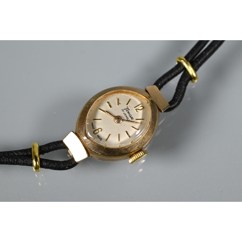 319 - Three various ladies wrist watches - an Eterna 14K on gilt metal expanding strap; a 9ct gold cased w... 