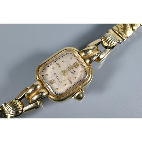 319 - Three various ladies wrist watches - an Eterna 14K on gilt metal expanding strap; a 9ct gold cased w... 