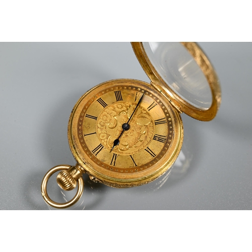 321 - A small 18K French pocket watch, with engraved gilt dial, crown wind, 33 mm dia., all-in 37.5g