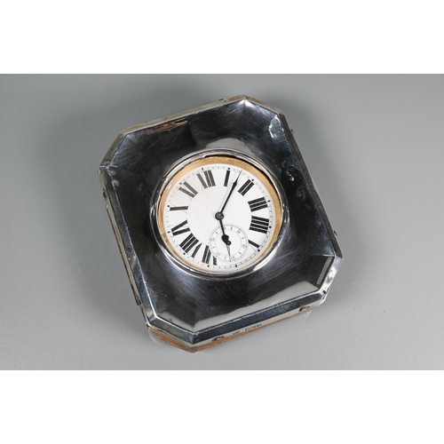 324 - A Goliath travel watch, the white enamelled dial with Roman numerals and subsidiary seconds, in a pa... 