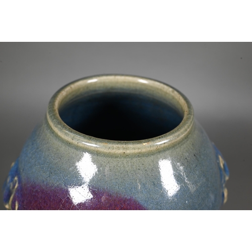 335 - A Chinese Junyao baluster vase with moulded taotie mask handles, opaque blue glaze with large irregu... 