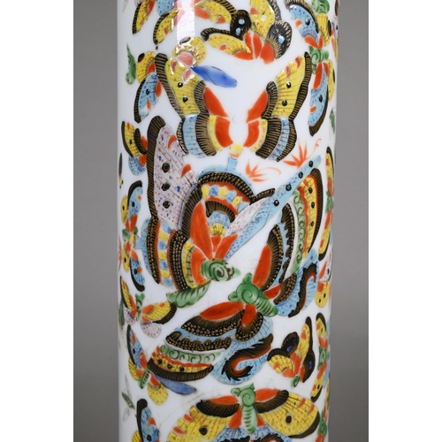 336 - A 19th century Chinese cylindrical sleeve vase painted in bright polychrome enamels with a kaleidosc... 