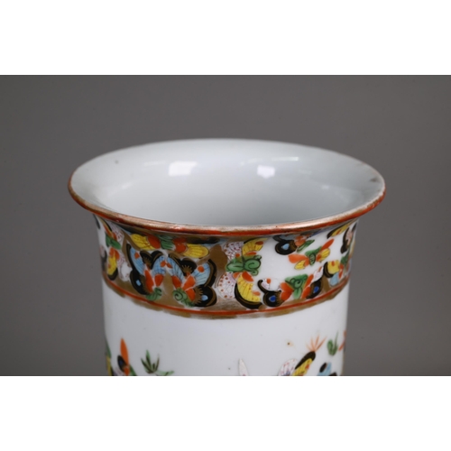 336 - A 19th century Chinese cylindrical sleeve vase painted in bright polychrome enamels with a kaleidosc... 