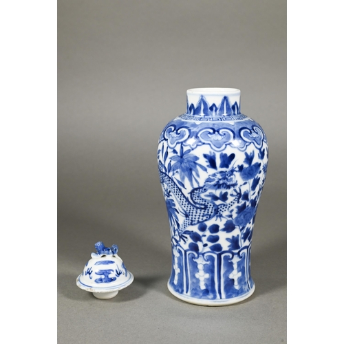 339 - A 19th century Chinese blue and white baluster vase painted with two dragons, Kangxi four-character ... 