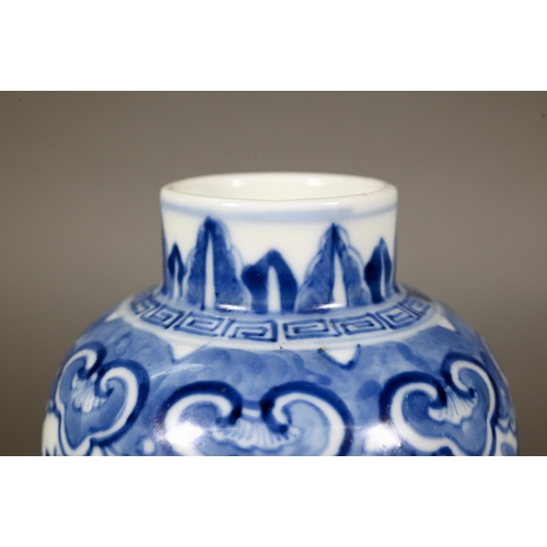 339 - A 19th century Chinese blue and white baluster vase painted with two dragons, Kangxi four-character ... 