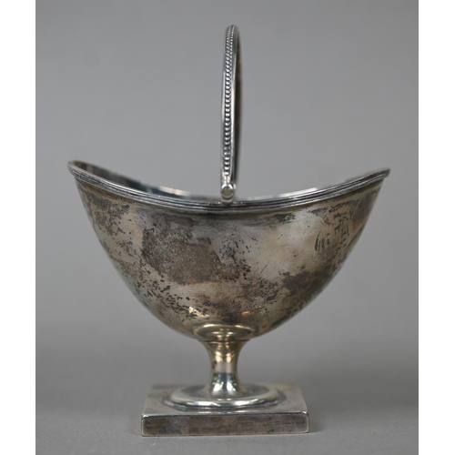 34 - A late Victorian Adam Revival silver bonbon basket with swing loop handle and stemmed square foot, N... 