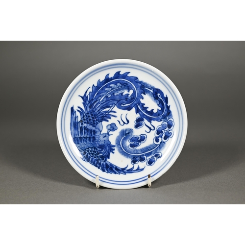 340 - A pair of Chinese blue and white circular stands or dishes, painted in underglaze blue with a dragon... 