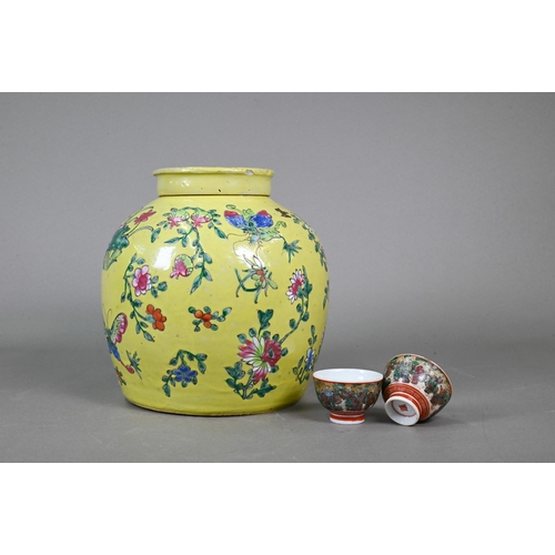 347 - A 19th century Chinese famille rose ginger jar and cover with lime-green glaze and decorated with bu... 