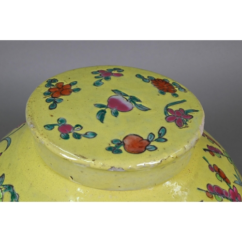 347 - A 19th century Chinese famille rose ginger jar and cover with lime-green glaze and decorated with bu... 