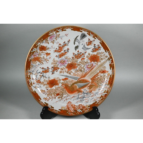 350 - A 19th century Japanese Kutani charger, Meiji period (1868-1912) painted with pheasants and other bi... 