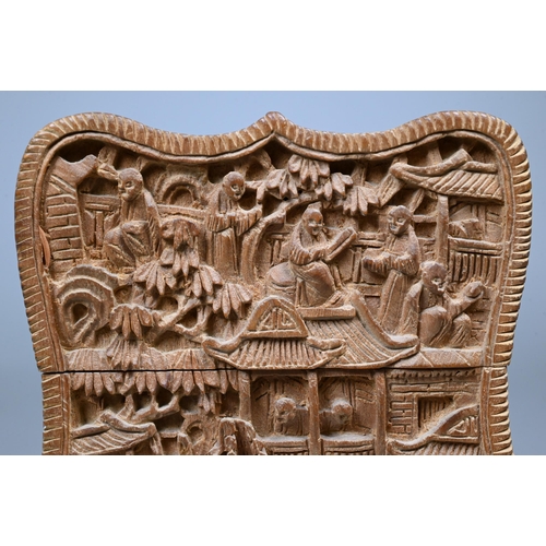 355 - A late 19th century Chinese Canton sandalwood card case, late Qing dynasty, profusely carved with a ... 