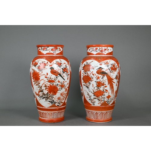 358 - A pair of 19th century Japanese Kutani vases, Meiji period (1868-1912) painted with panels of flower... 