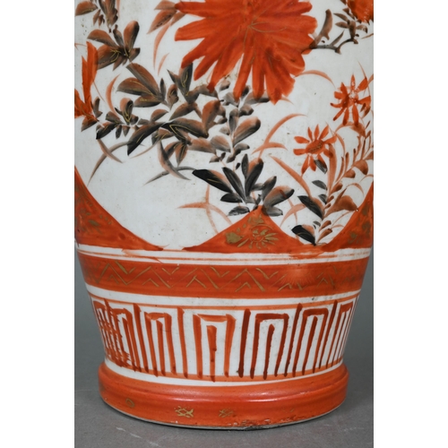 358 - A pair of 19th century Japanese Kutani vases, Meiji period (1868-1912) painted with panels of flower... 