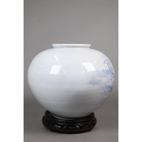 361 - A 20th century Korean blue and white globular vase painted in underglaze blue with a mountainous riv... 