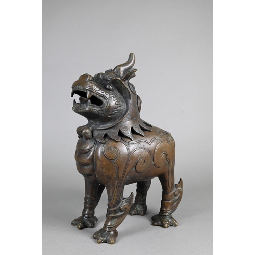 363 - A Chinese bronze Luduan-form mythical beast censer in the Yuan/Ming dynasty manner, cast standing fo... 