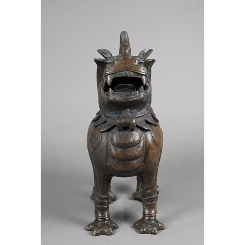 363 - A Chinese bronze Luduan-form mythical beast censer in the Yuan/Ming dynasty manner, cast standing fo... 