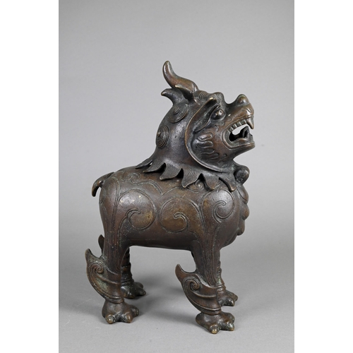 363 - A Chinese bronze Luduan-form mythical beast censer in the Yuan/Ming dynasty manner, cast standing fo... 