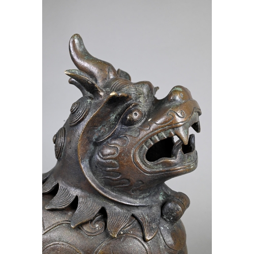 363 - A Chinese bronze Luduan-form mythical beast censer in the Yuan/Ming dynasty manner, cast standing fo... 