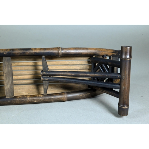 365 - A late 19th century Chinese bamboo folding headrest or pillow, late Qing period, 48 cm wide to/w a b... 