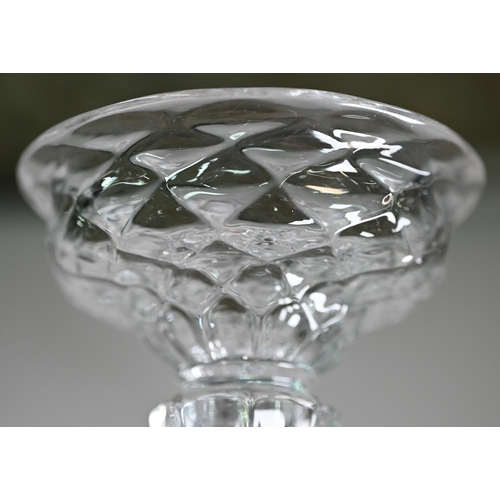 527 - A 19th Century pressed dessert glass with scale design on tapering octagonal stem and domed foot wit... 