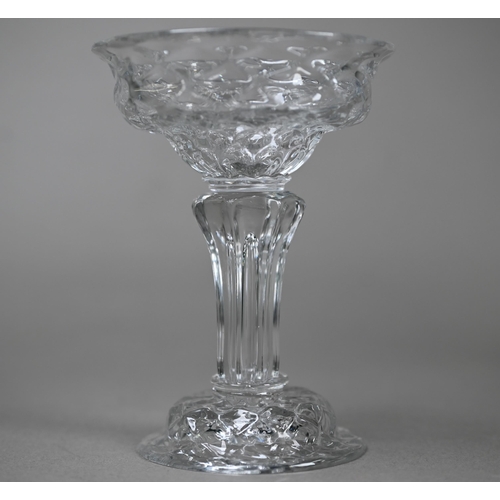 527 - A 19th Century pressed dessert glass with scale design on tapering octagonal stem and domed foot wit... 