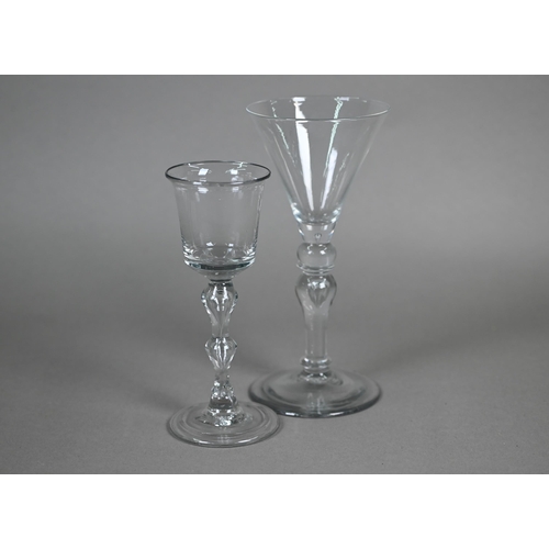 533 - A drinking glass with flared bucket bowl on hollow double knop baluster stem and folded foot, 16.7 c... 