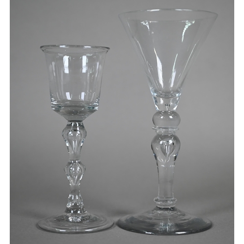 533 - A drinking glass with flared bucket bowl on hollow double knop baluster stem and folded foot, 16.7 c... 