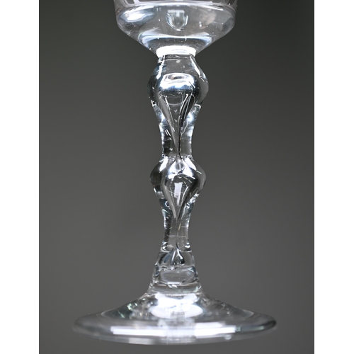 533 - A drinking glass with flared bucket bowl on hollow double knop baluster stem and folded foot, 16.7 c... 