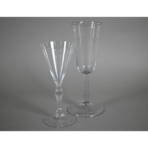 534 - An ale glass with tapering flute bowl on plain stem and domed and folded foot, 29 cm, to/w a glass w... 