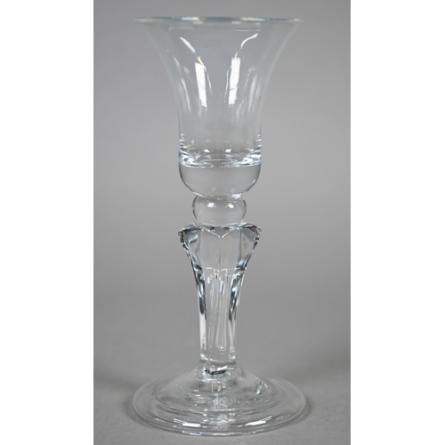 534 - An ale glass with tapering flute bowl on plain stem and domed and folded foot, 29 cm, to/w a glass w... 