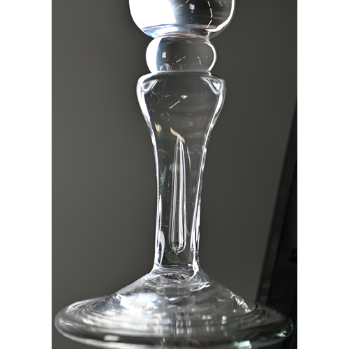 534 - An ale glass with tapering flute bowl on plain stem and domed and folded foot, 29 cm, to/w a glass w... 