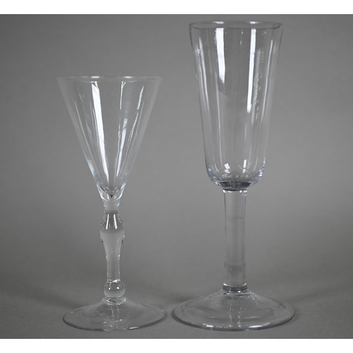 534 - An ale glass with tapering flute bowl on plain stem and domed and folded foot, 29 cm, to/w a glass w... 