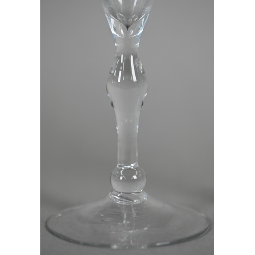 534 - An ale glass with tapering flute bowl on plain stem and domed and folded foot, 29 cm, to/w a glass w... 