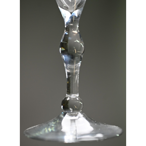 534 - An ale glass with tapering flute bowl on plain stem and domed and folded foot, 29 cm, to/w a glass w... 