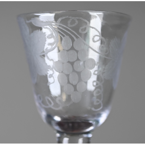 538 - A Georgian cordial glass with vine-etched ogee bowl on plain stem and conical folded foot, 14.3 cm h... 