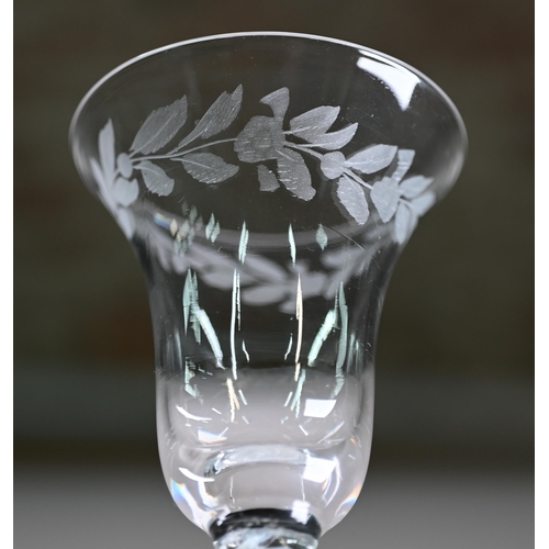 540 - A cordial glass with foliate-etched bell bowl and triple-knop opaque twist stem, 17.5 cm, to/w anoth... 