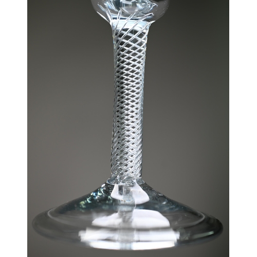 546 - A drinking glass with bell bowl on air twist stem and folded foot, 17 cm to/w a small example on con... 