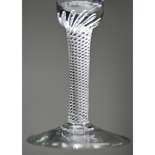 546 - A drinking glass with bell bowl on air twist stem and folded foot, 17 cm to/w a small example on con... 