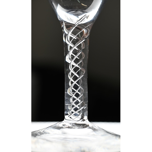 547 - A cordial glass with round funnel bowl on air twist baluster stem and conical foot, 16 cm, to/w a wi... 